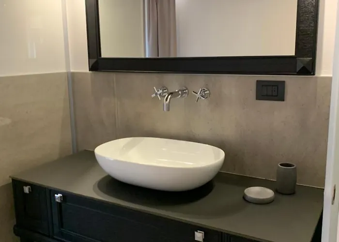 Апартаменты Apartmentsarena - Corte Degli Eremitani
