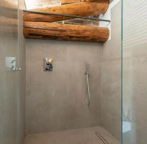 Апартаменты Apartmentsarena - Corte Degli Eremitani
