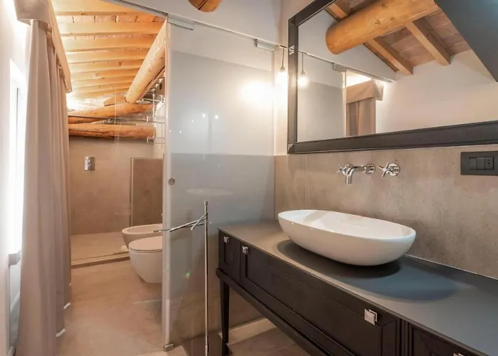 Апартаменты Apartmentsarena - Corte Degli Eremitani